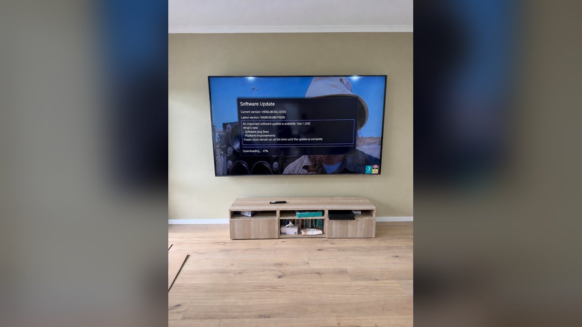100 inch Hisense TV wall mounted on sage green wall in Belrose home by That TV Guy Northern Beaches