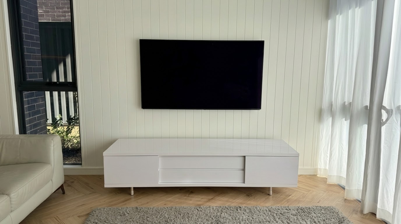 65 inch Sony TV wall mounted on VJ panelling in a Warriewood living room, Northern Beaches