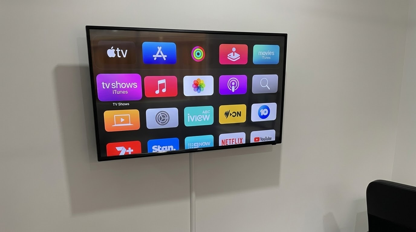Apple TV home screen on a wall-mounted TV, Northern Beaches
