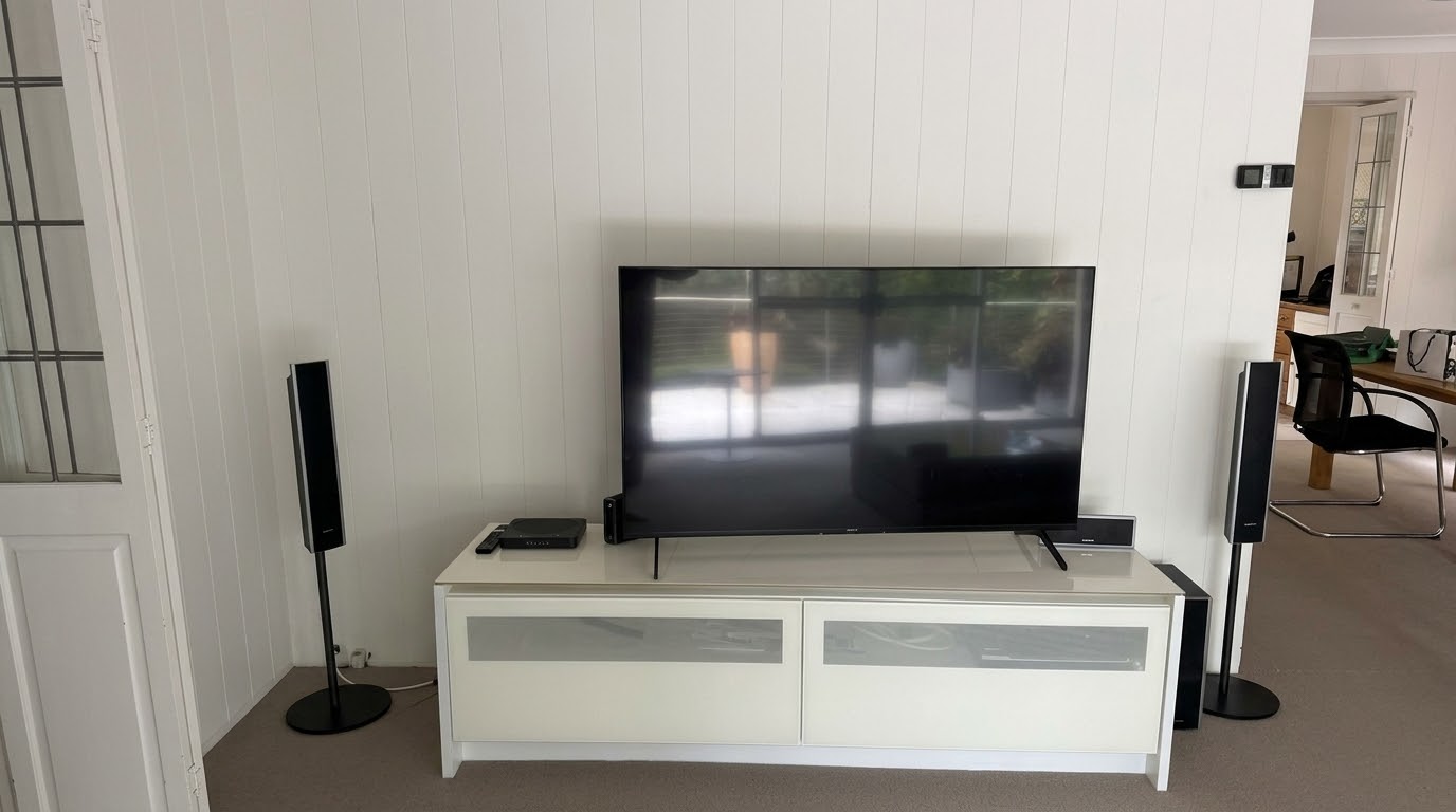 55-inch Sony TV on its stand on a white cabinet in Cromer before the TV wall mount